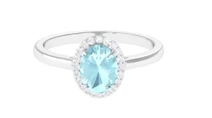 1.50 CT Oval Shape Sky Blue Topaz Engagement Ring with Diamond Halo