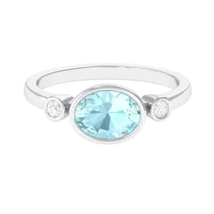 Oval Cut Solitaire Sky Blue Topaz East West Ring with Diamond