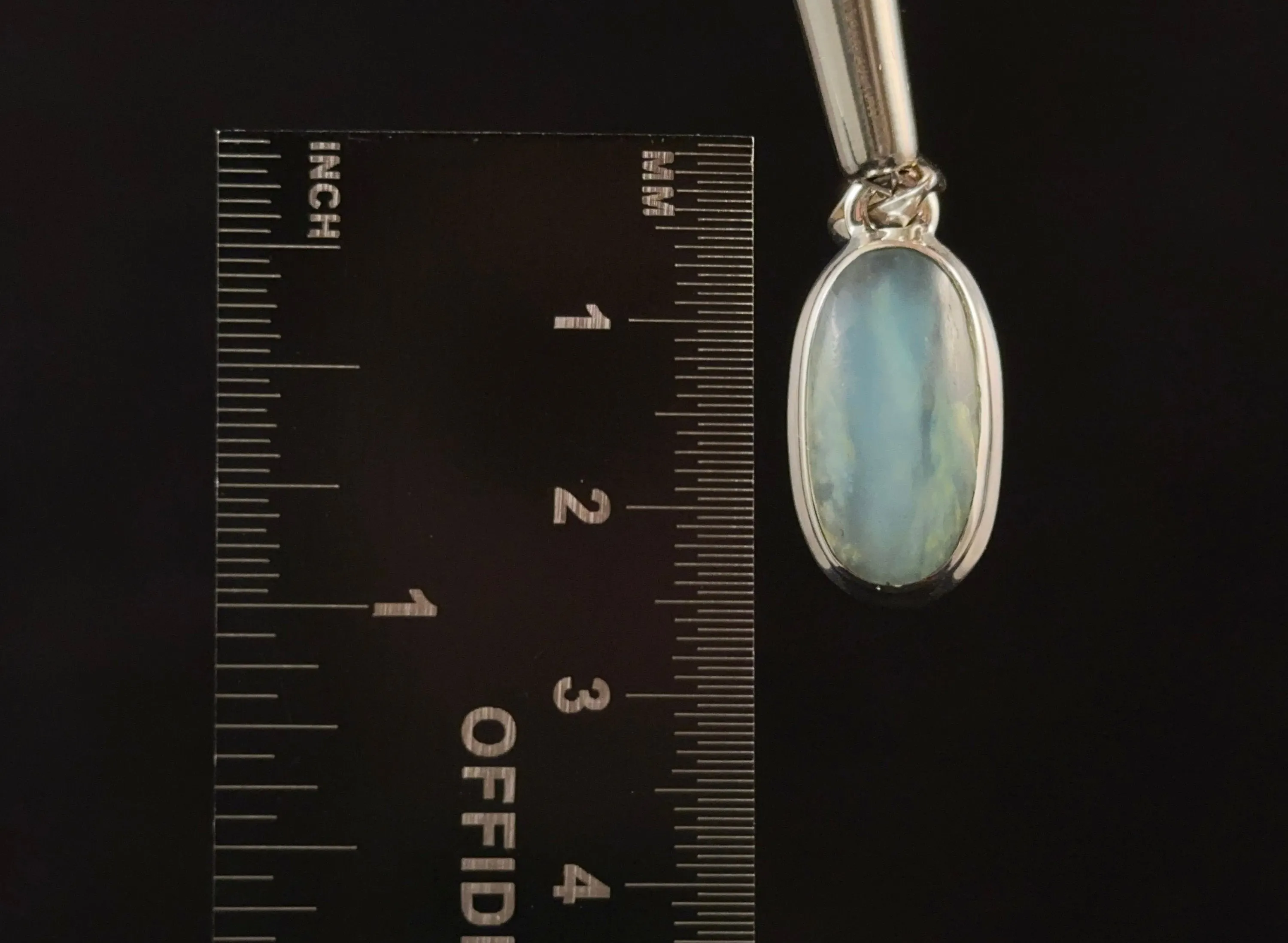PERUVIAN OPAL Crystal Pendant - Genuine BLUE Opal Oval Cabochon with a Polished Finish and Set in a Sterling Silver Open Back Bezel, 52904